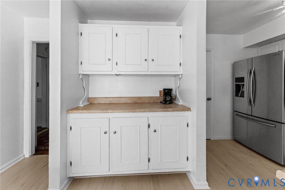 1760 Gloucester Road Gloucester Point, VA 23062 - Photo 16 of 47 Built-in white cabinetry with a light-toned counte