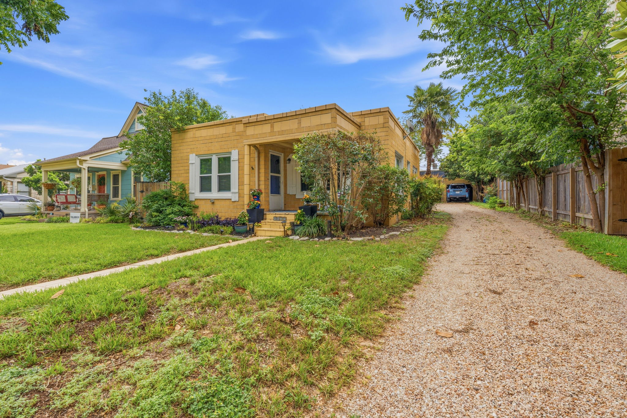 4611 Rosedale Avenue Austin, TX 78756 - Photo 5 of 35 A long, deep driveway provides parking for multiple vehicles — a genuine premium in one of Austin's most walkable and sought-after neighborhoods.