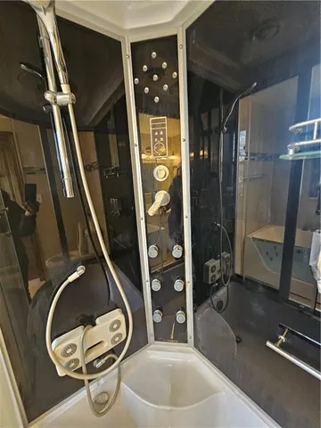 a bathroom with a toilet and a sink