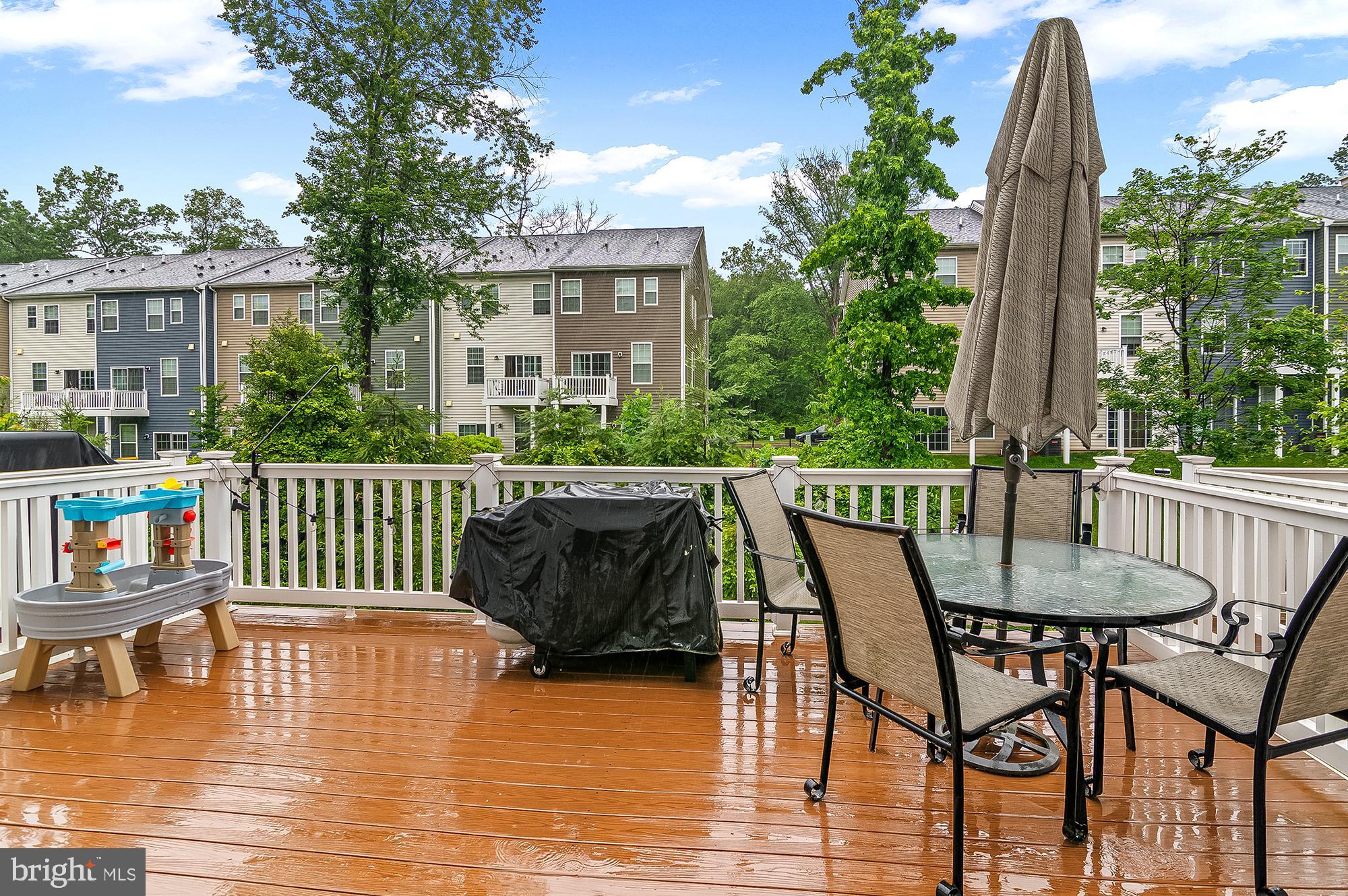 1022 Linden Drive Hanover, MD 21076 - Photo 22 of 42 a view of a chairs and table on the roof deck