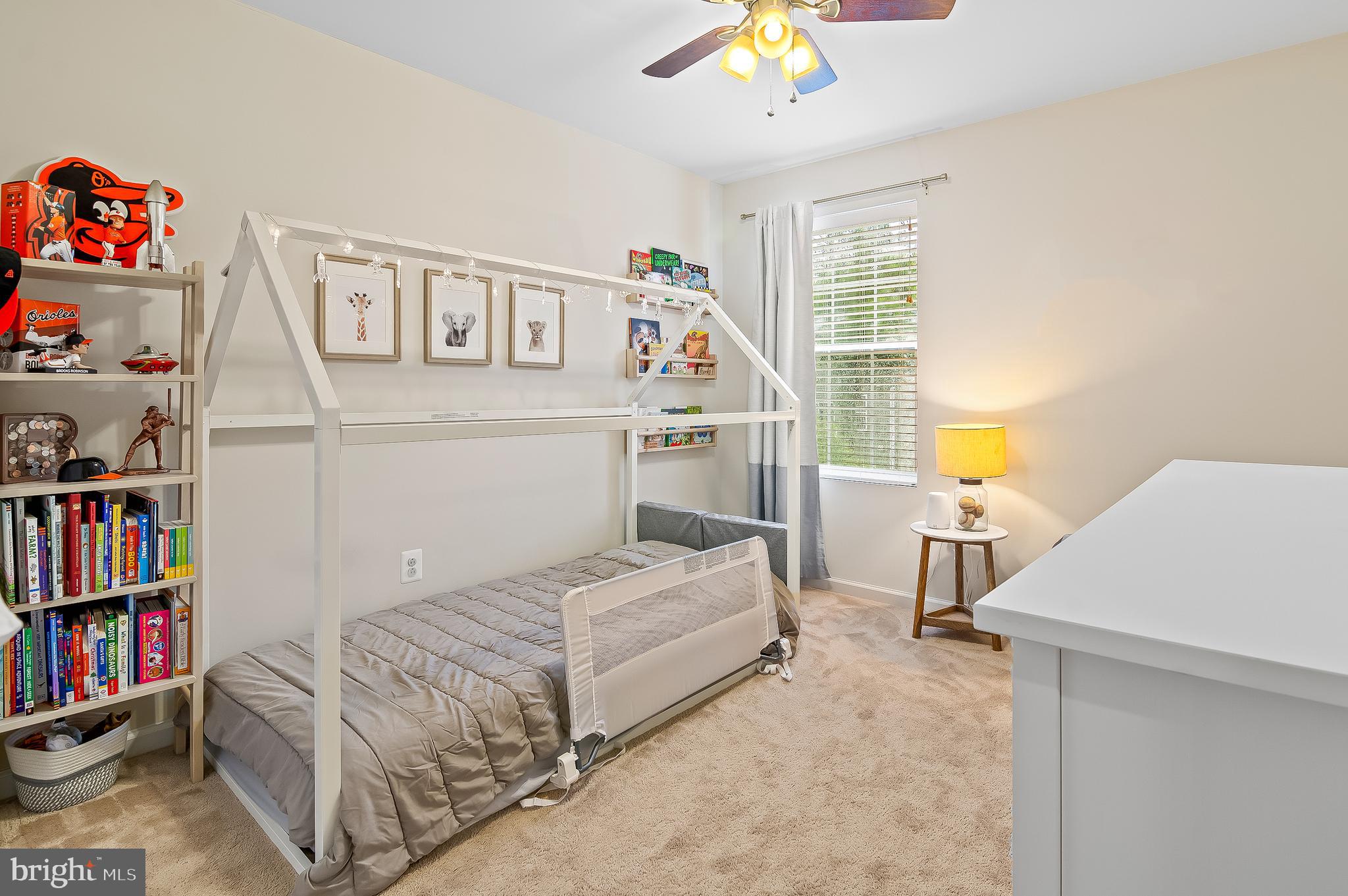 1022 Linden Drive Hanover, MD 21076 - Photo 25 of 42 a bedroom with furniture and a book shelf