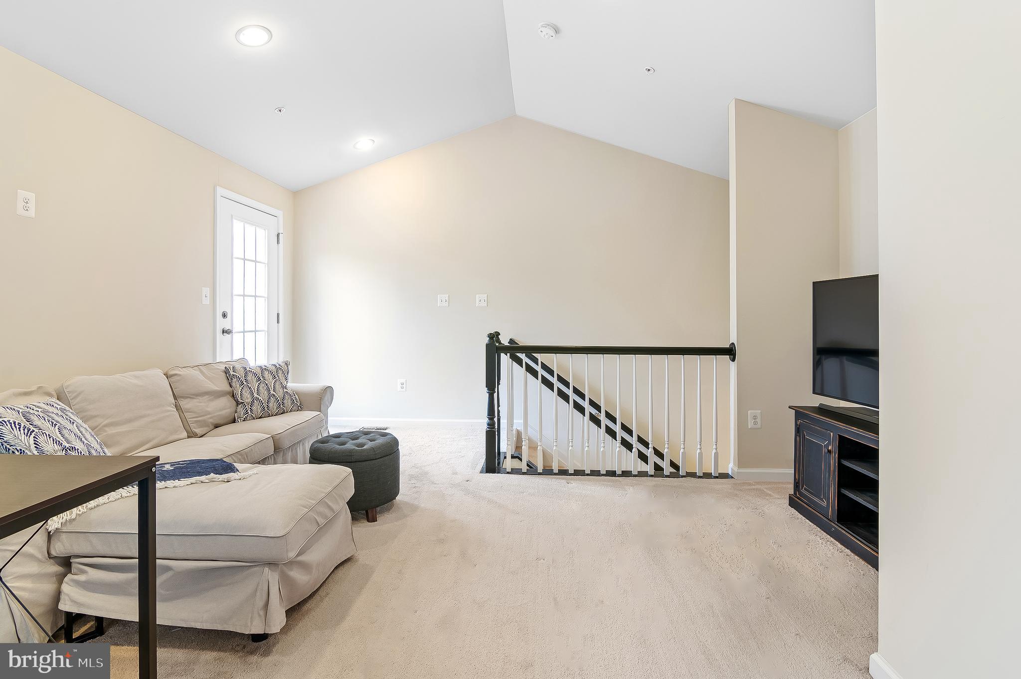 1022 Linden Drive Hanover, MD 21076 - Photo 39 of 42 a living room with furniture a air conditioner and a window