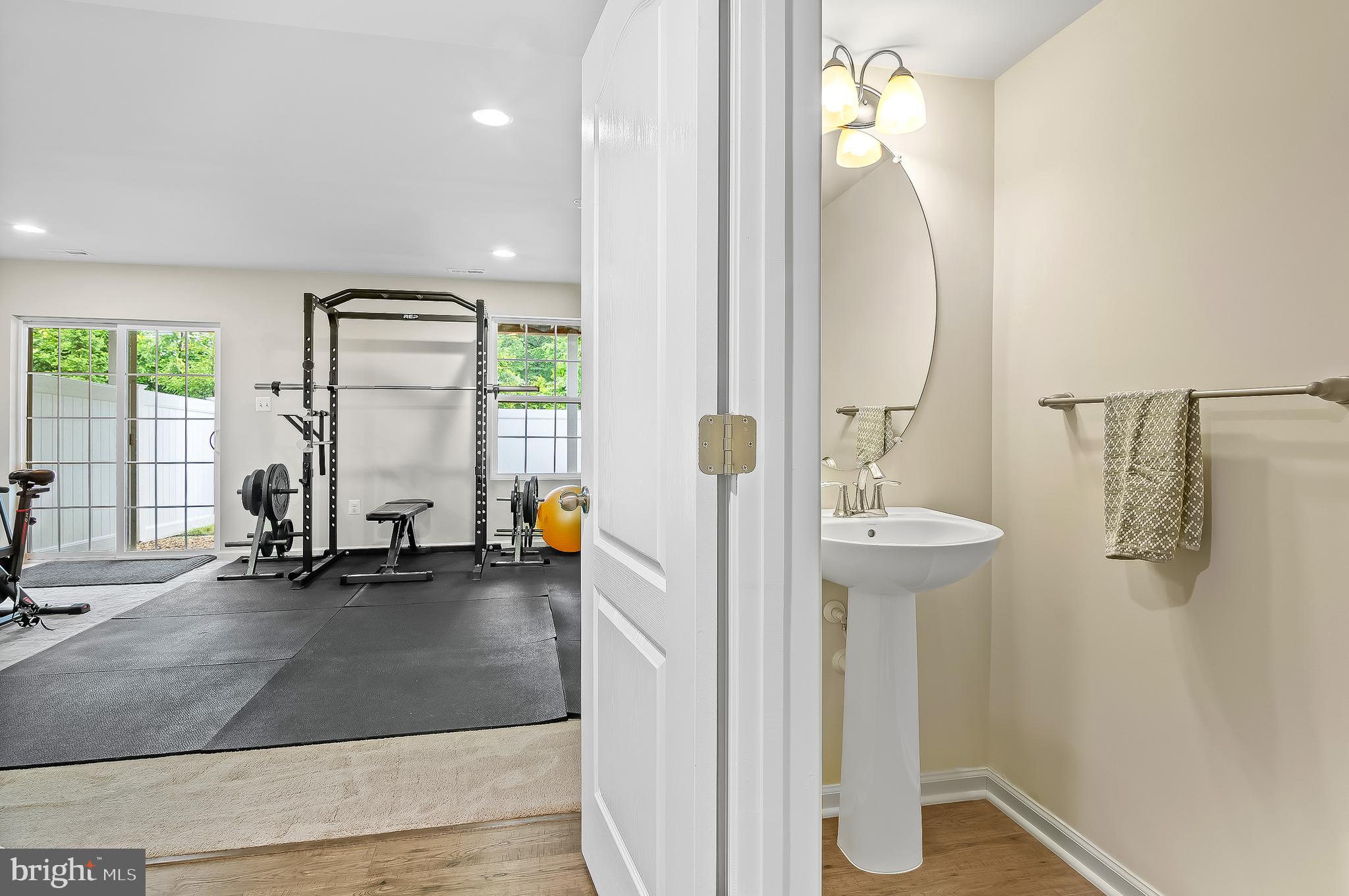 1022 Linden Drive Hanover, MD 21076 - Photo 7 of 42 a view of a room with gym equipment