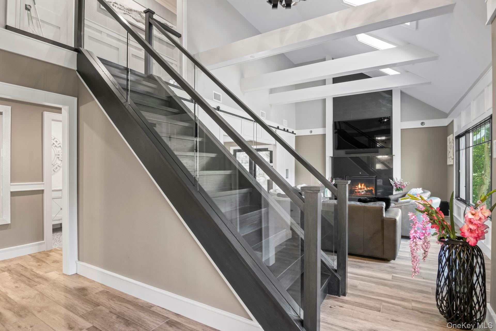 131 Fleets Cove Road Huntington, NY 11743 - Photo 12 of 41 a view of entryway and hall with wooden floor