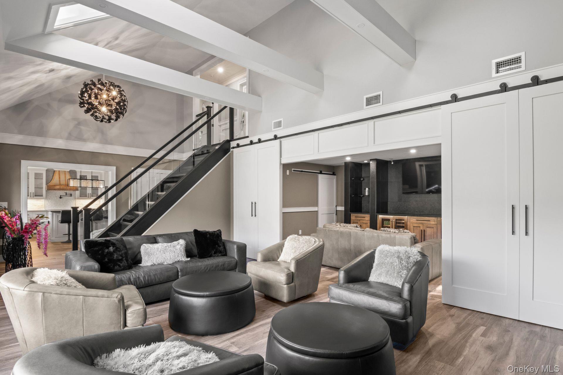 131 Fleets Cove Road Huntington, NY 11743 - Photo 16 of 41 a living room with furniture and a ceiling fan