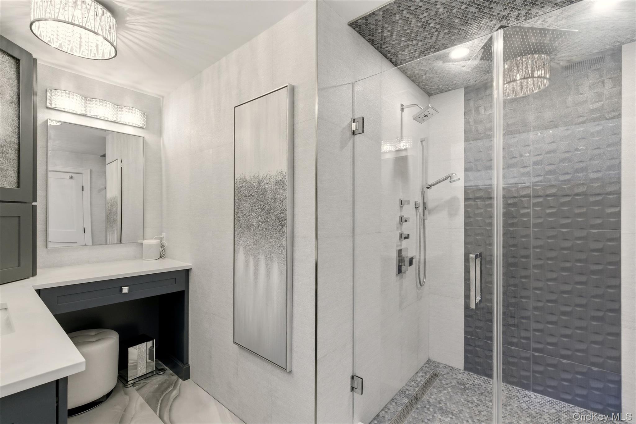 131 Fleets Cove Road Huntington, NY 11743 - Photo 27 of 41 a bathroom with a shower a sink and a mirror