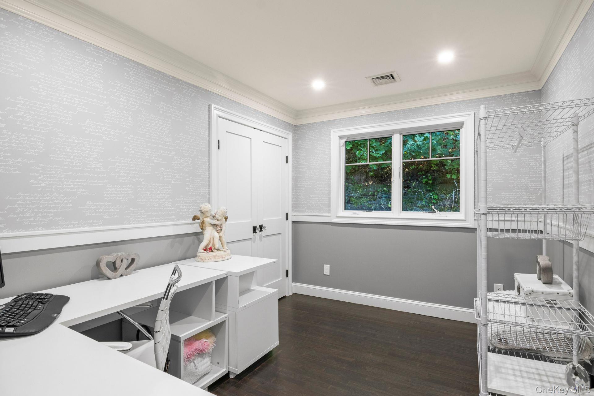 131 Fleets Cove Road Huntington, NY 11743 - Photo 30 of 41 a room with a bed and a window