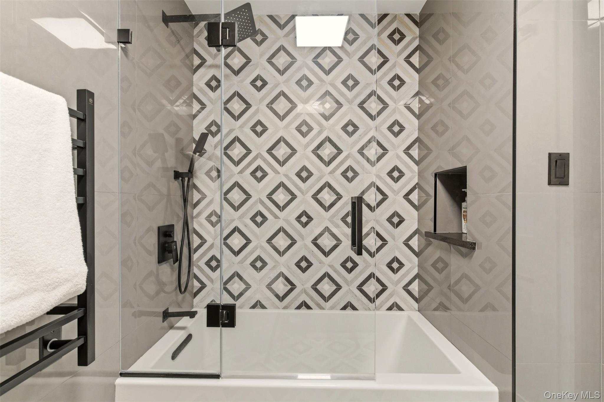 131 Fleets Cove Road Huntington, NY 11743 - Photo 32 of 41 a bathroom with a bathtub