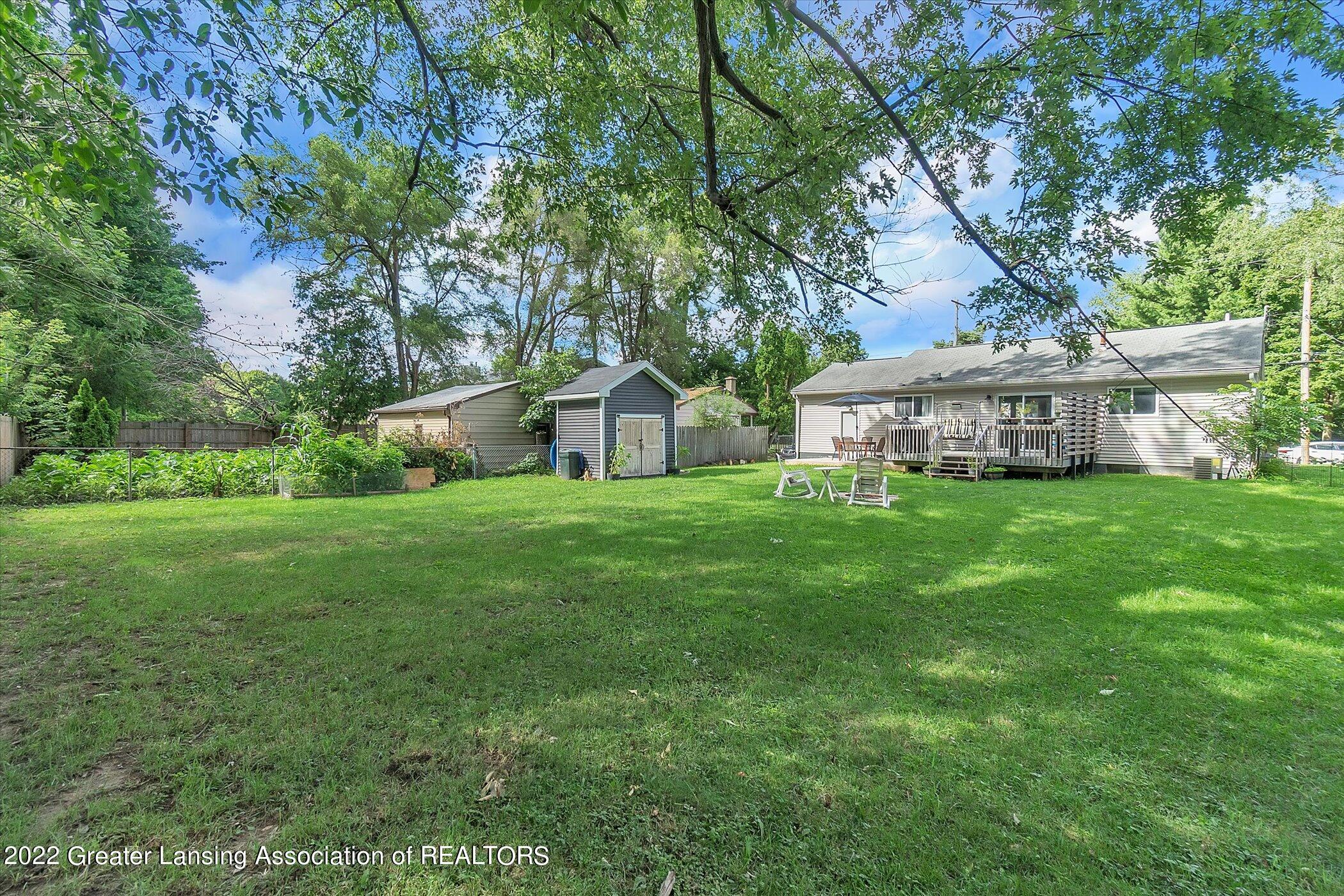 5802 Hughes Road Lansing, MI 48911 - Photo 35 of 37 35-5802-Hughes-Rd-WindowStill-Real-Estat