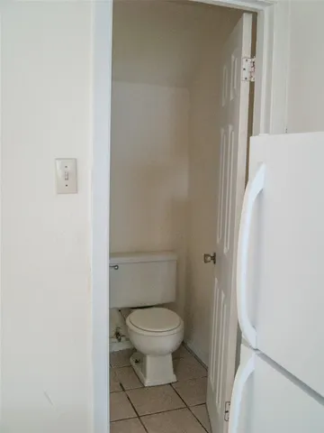 a bathroom with a toilet