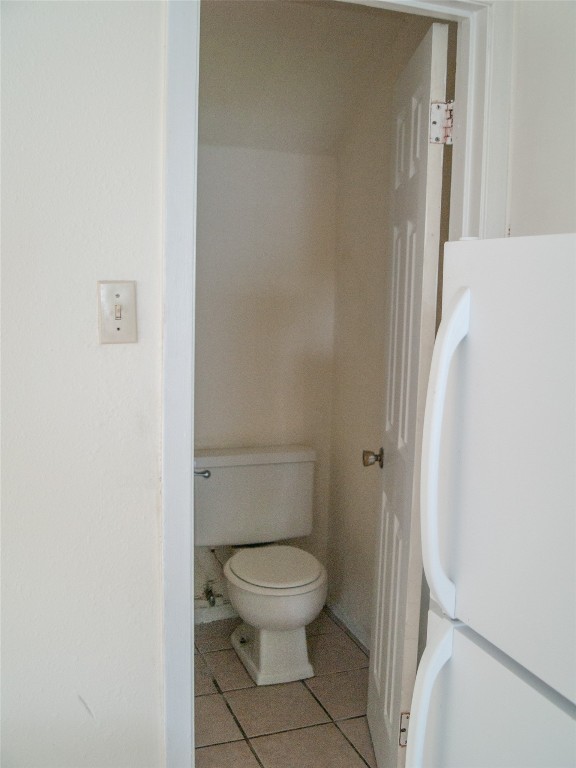 1745 Wooten Park Drive, Unit 101 Austin, TX 78757 - Photo 8 of 19 a bathroom with a toilet