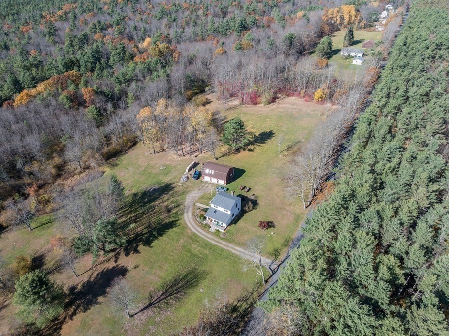 280 Stone Street Gardner, MA 01440 - Photo 25 of 28 an aerial view of a house with a yard