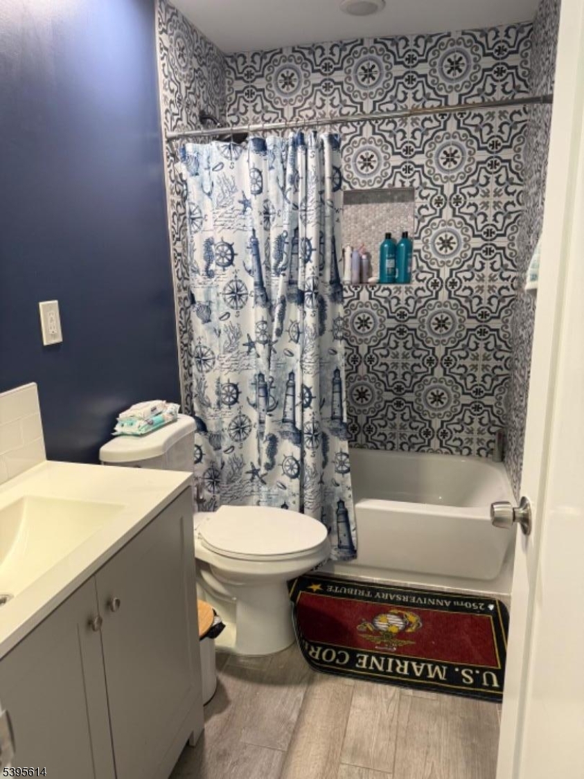 342 South 20th Street Newark, NJ 07103 - Photo 11 of 25 a bathroom with a sink a toilet and shower