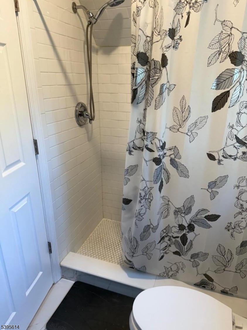 342 South 20th Street Newark, NJ 07103 - Photo 20 of 25 a bathroom with a sink toilet and shower