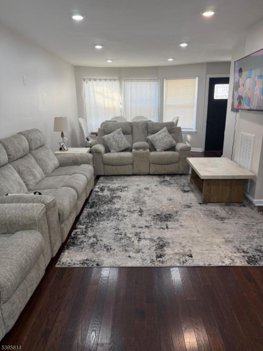 342 South 20th Street Newark, NJ 07103 - Photo 3 of 25 a living room with furniture and a wooden floor