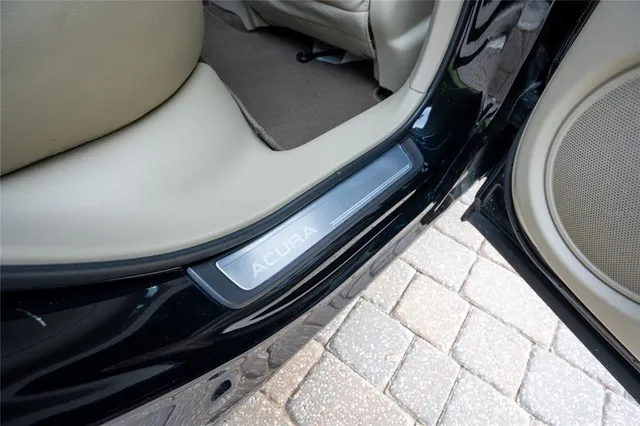 a front view of a house with parking space