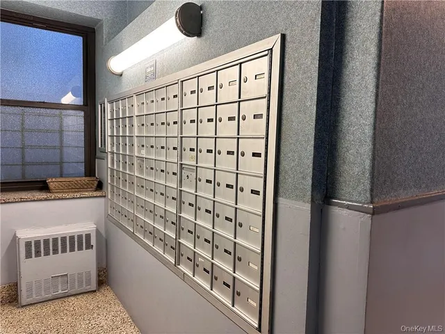 a bathroom with a shower and a sink