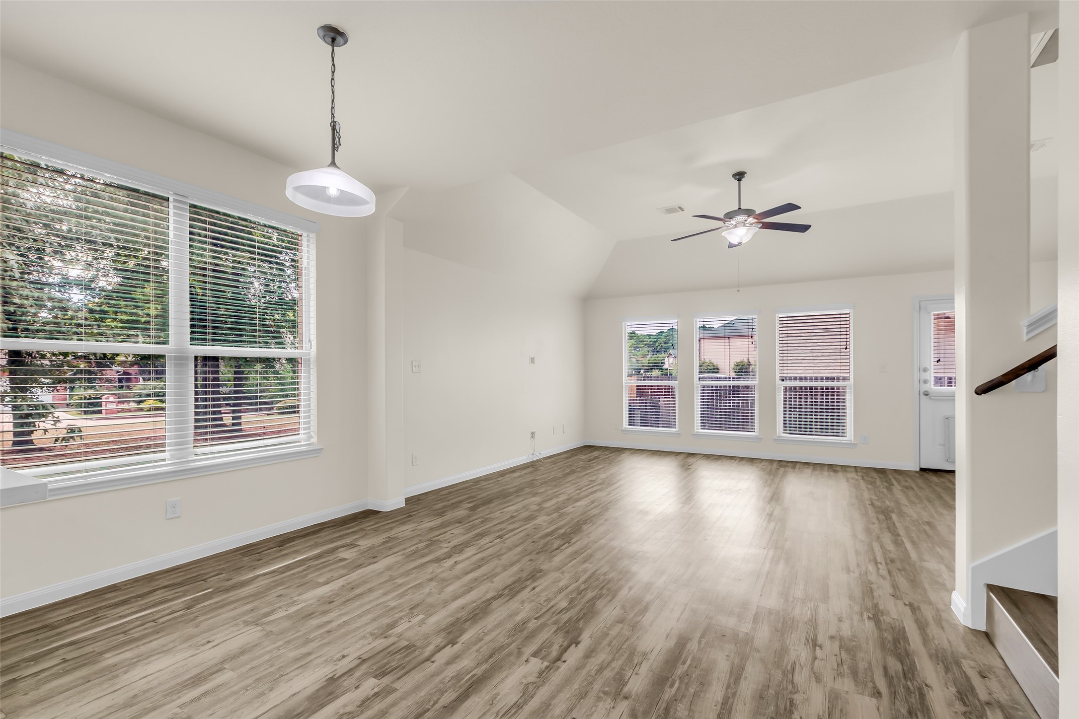 3807 Springcrest Lane Montgomery, TX 77356 - Photo 11 of 31 a view of an empty room with wooden floor and a window
