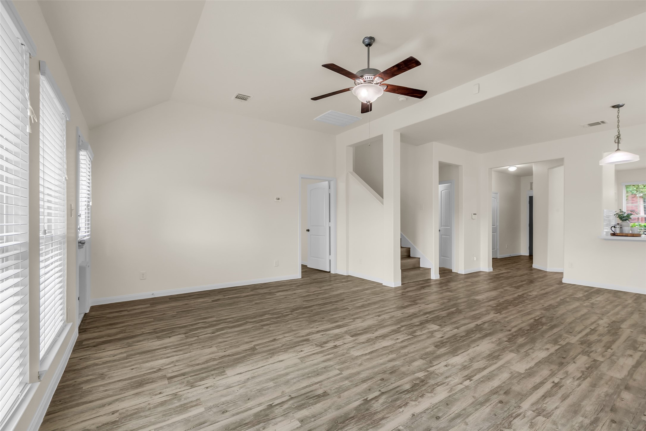 3807 Springcrest Lane Montgomery, TX 77356 - Photo 15 of 31 a view of an empty room with wooden floor and a window