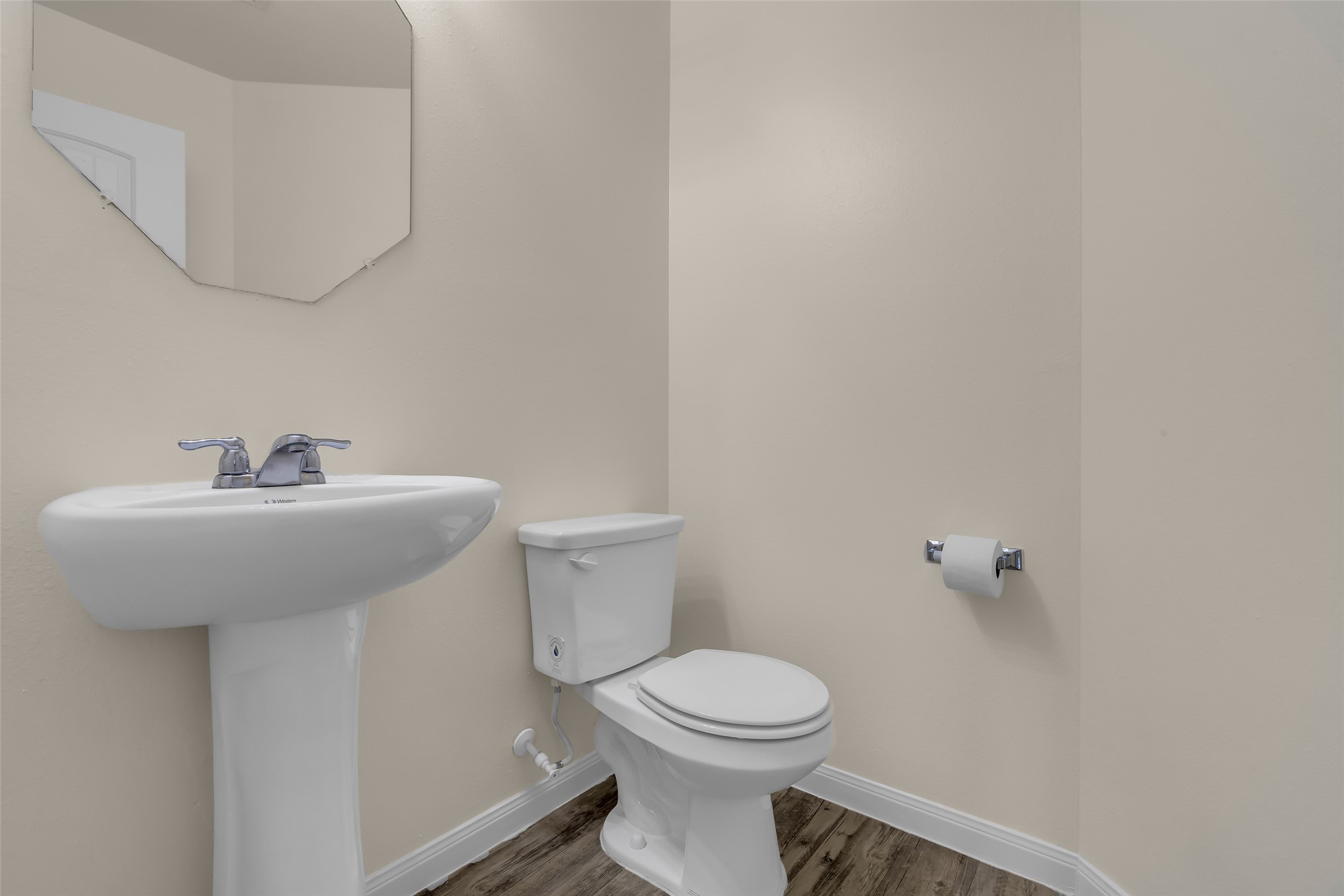 3807 Springcrest Lane Montgomery, TX 77356 - Photo 16 of 31 a bathroom with a sink a toilet and mirror