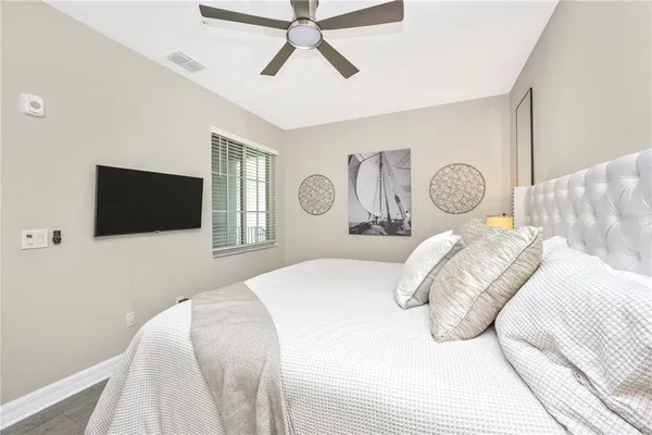 a view of a balcony with wooden floor