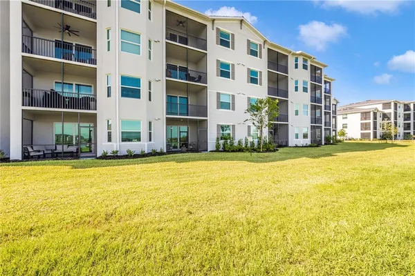 a view of a swimming pool with a lake view
