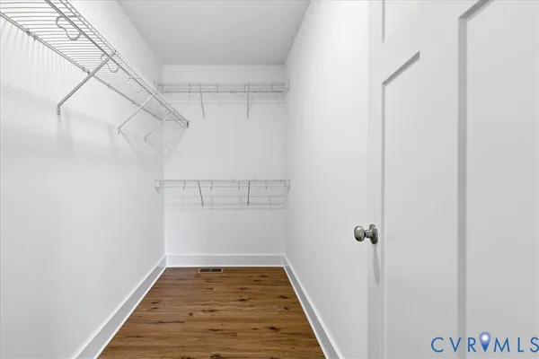 a view of a room with racks on the wall