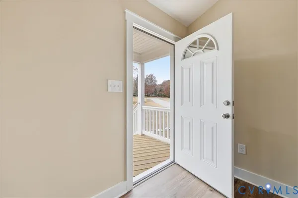 a view of a hallway with entryway