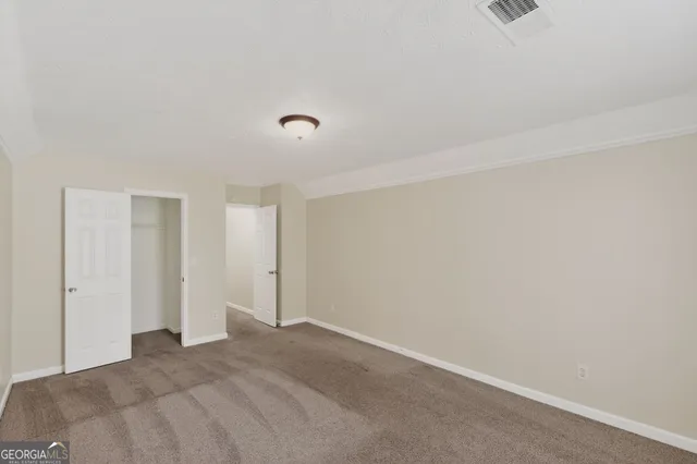 a view of a room with closet and tap