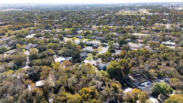 an aerial view of town with residential houses with city view