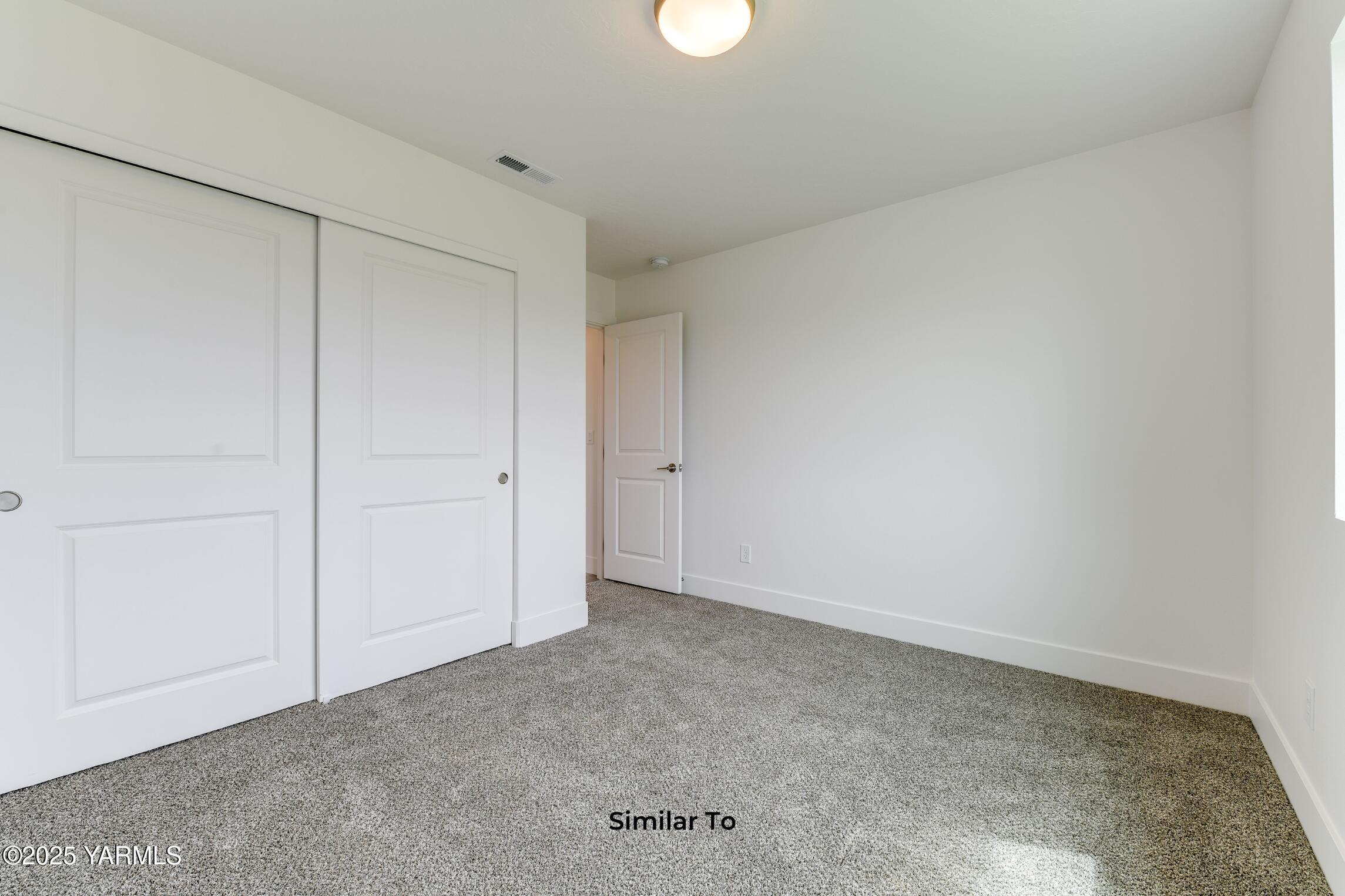 604 Vineyard Street, Unit PHASE 2 LOT 13) SPEC Grandview, WA 98930 - Photo 13 of 19 a view of an empty room