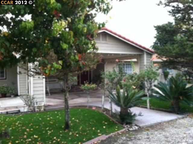 618 Brownstone Road Oakley, CA 94561 - Photo 1 of 1 a view of a house with a yard