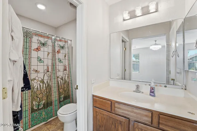 a view of a backyard with sitting area