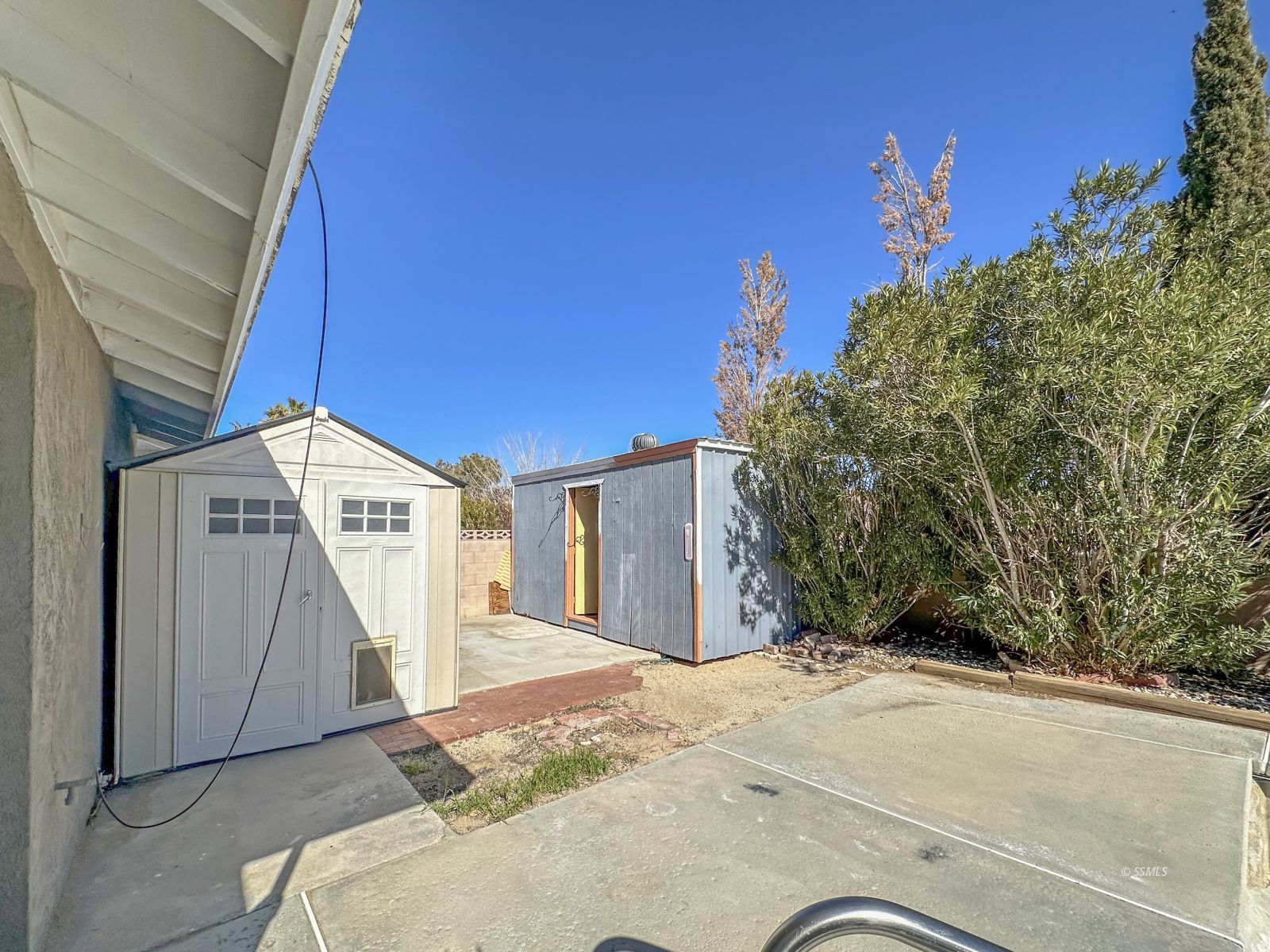 504 Randall Street Ridgecrest, CA 93555 - Photo 25 of 29 a view of a house with a backyard