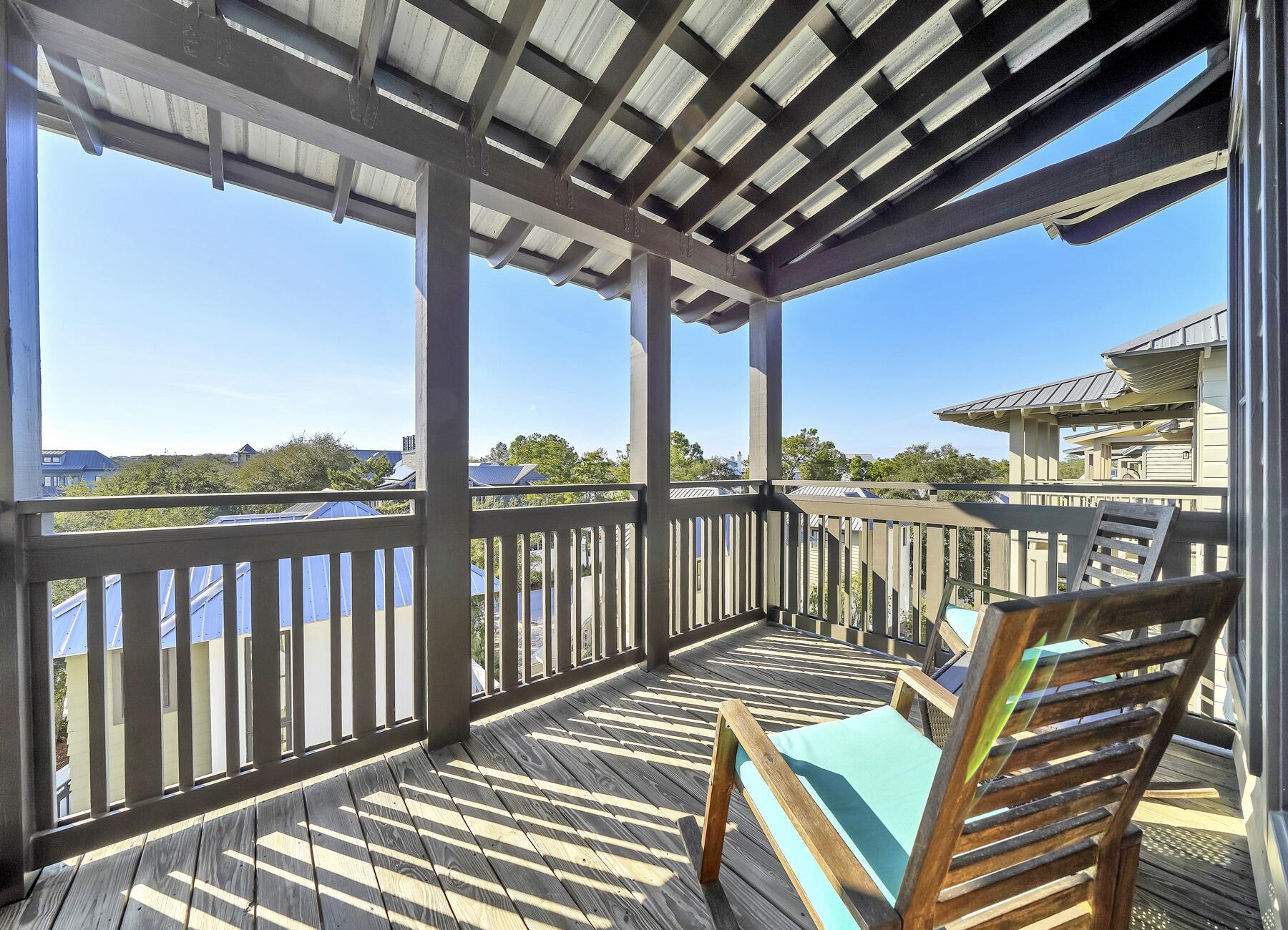 76 North Winston Ln Inlet Beach Inlet Beach, FL 32461 - Photo 14 of 69 a view of a balcony with wooden floor