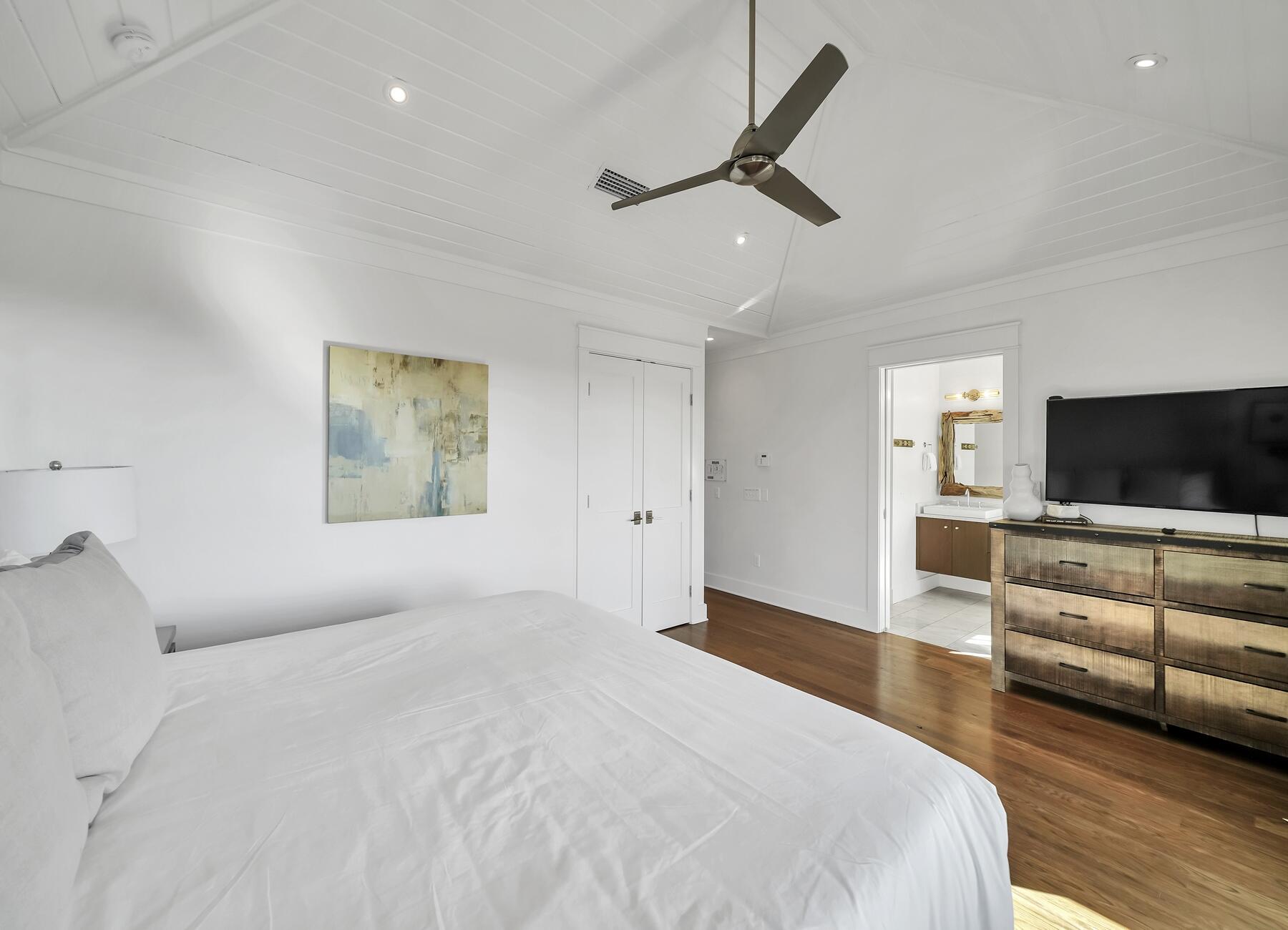 76 North Winston Ln Inlet Beach Inlet Beach, FL 32461 - Photo 52 of 69 a bedroom with a bed and a flat screen tv