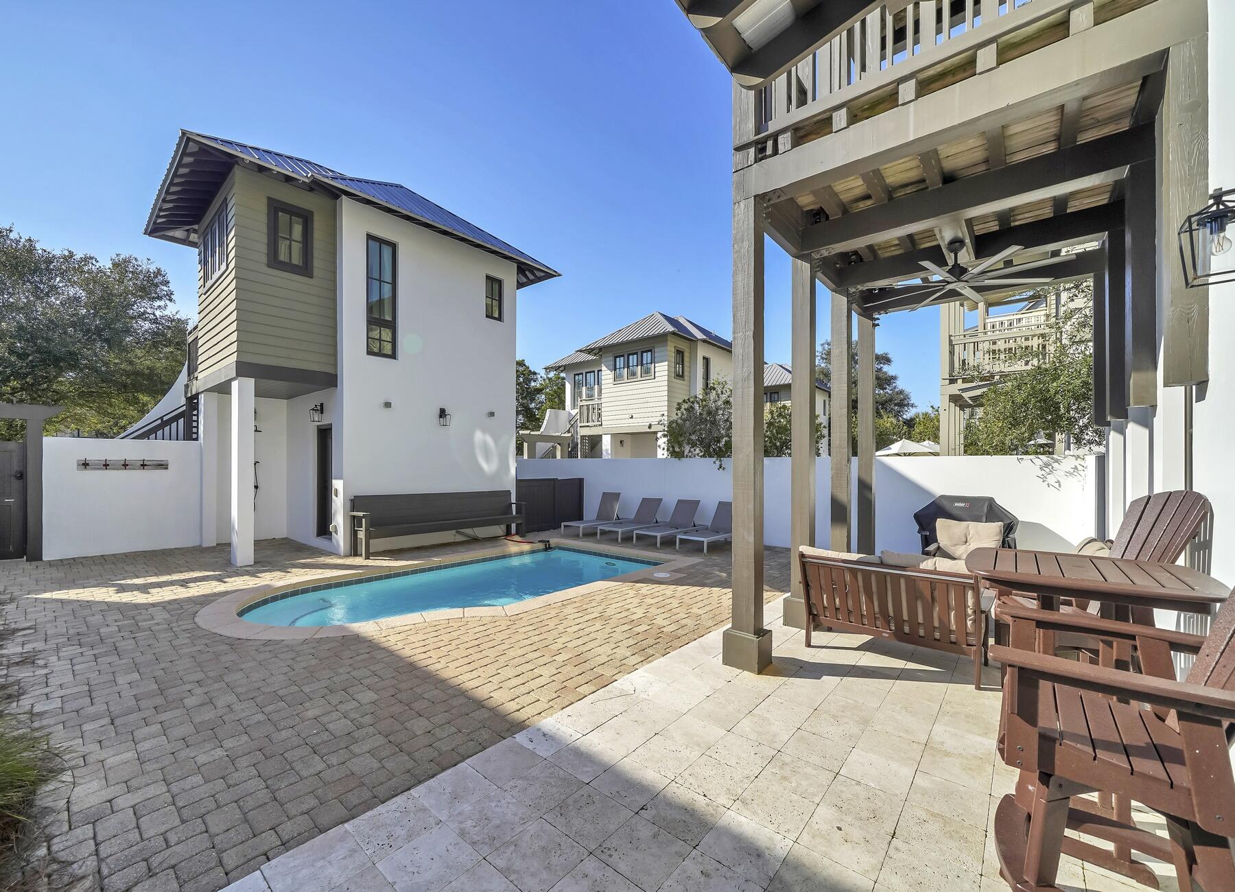 76 North Winston Ln Inlet Beach Inlet Beach, FL 32461 - Photo 10 of 69 a front view of a house with garden