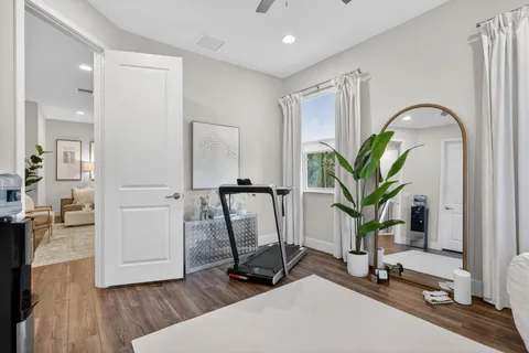 a view of a room with gym equipment