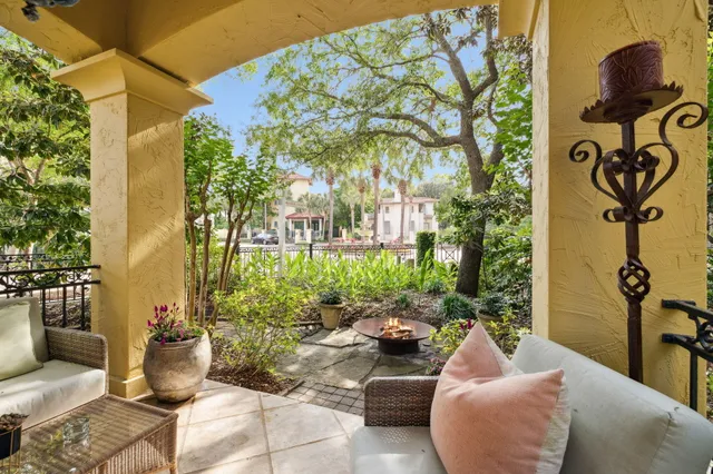 a view of a dining room with furniture wooden floor and chandelier