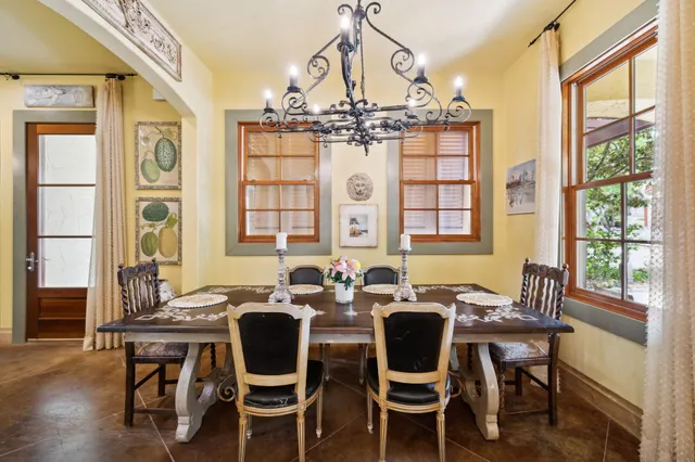 a bathroom with a toilet and a mirror