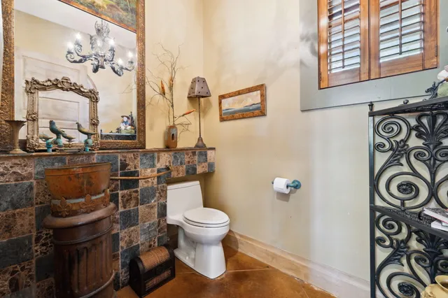a bathroom with a tub and a sink