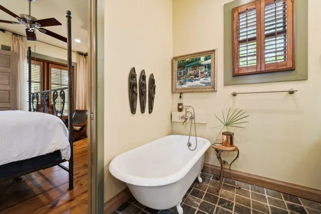 a view of a balcony with table and chairs