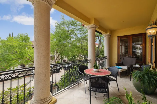a view of a swimming pool with a patio