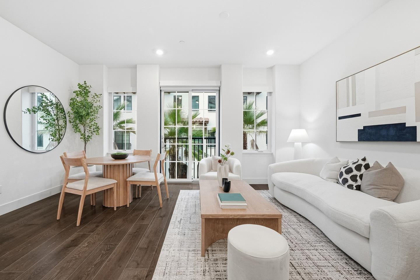 21504 Point Reyes Terrace Cupertino, CA 95014 - Photo 2 of 55 a living room with furniture a table and a large window