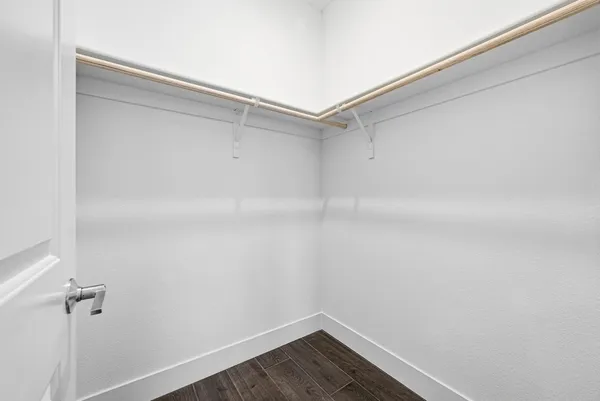 a view of an empty walk in closet
