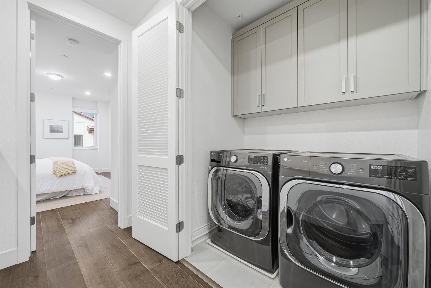 21504 Point Reyes Terrace Cupertino, CA 95014 - Photo 29 of 55 a view of a hallway with washer and dryer