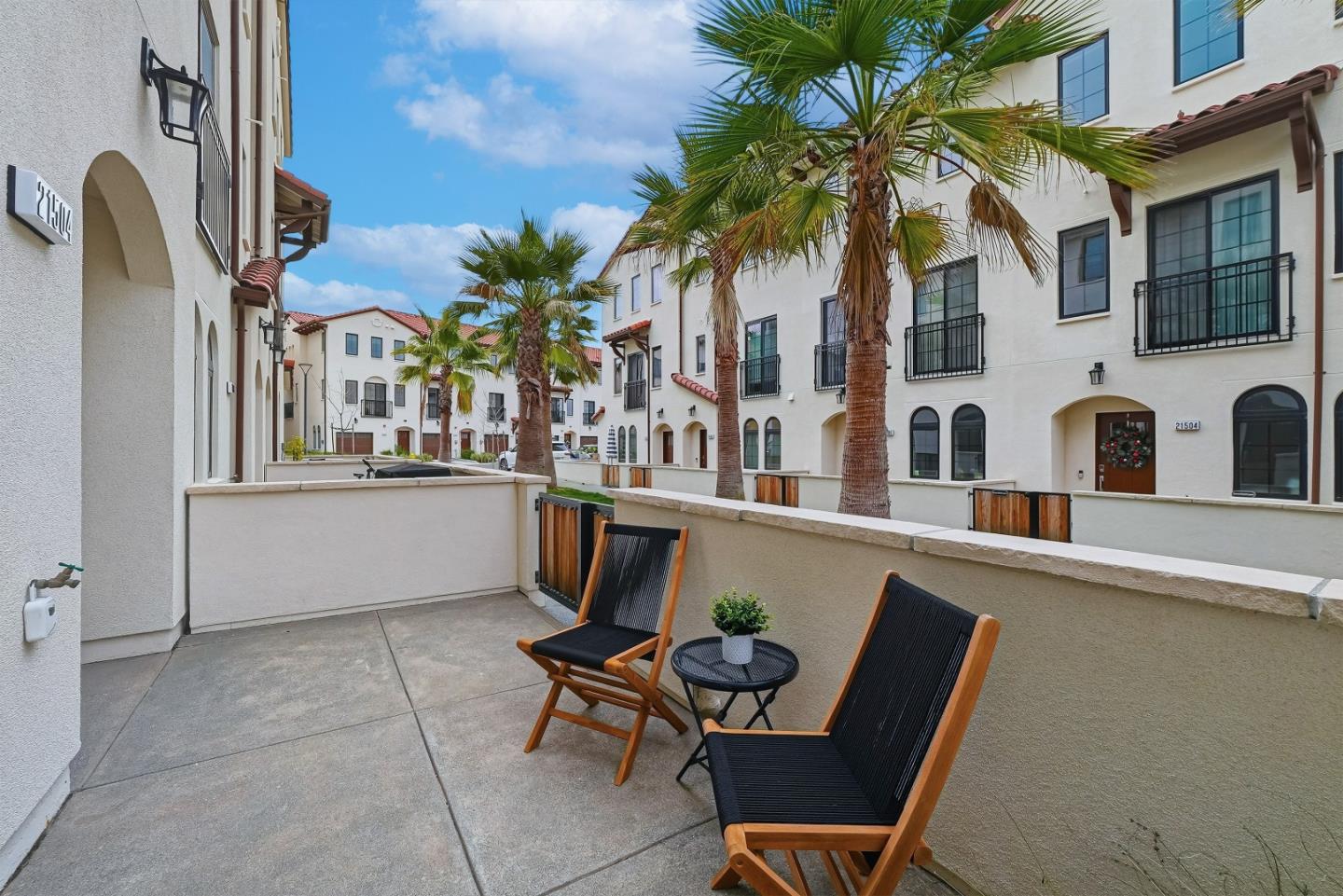 21504 Point Reyes Terrace Cupertino, CA 95014 - Photo 33 of 55 a view of a chairs and table in a patio