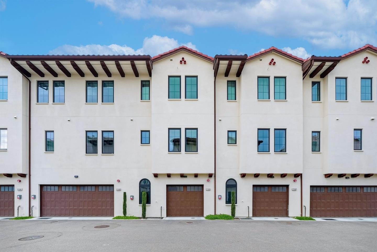 21504 Point Reyes Terrace Cupertino, CA 95014 - Photo 42 of 55 a front view of a house with a yard and garage