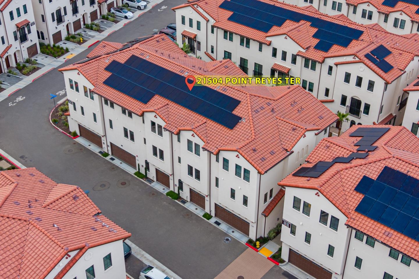 21504 Point Reyes Terrace Cupertino, CA 95014 - Photo 44 of 55 a large building with an outdoor space