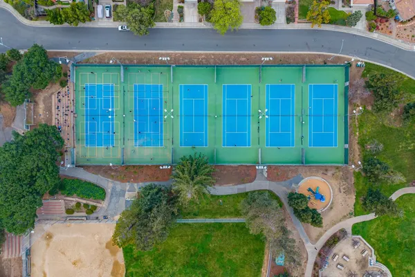 an aerial view of a house with outdoor space